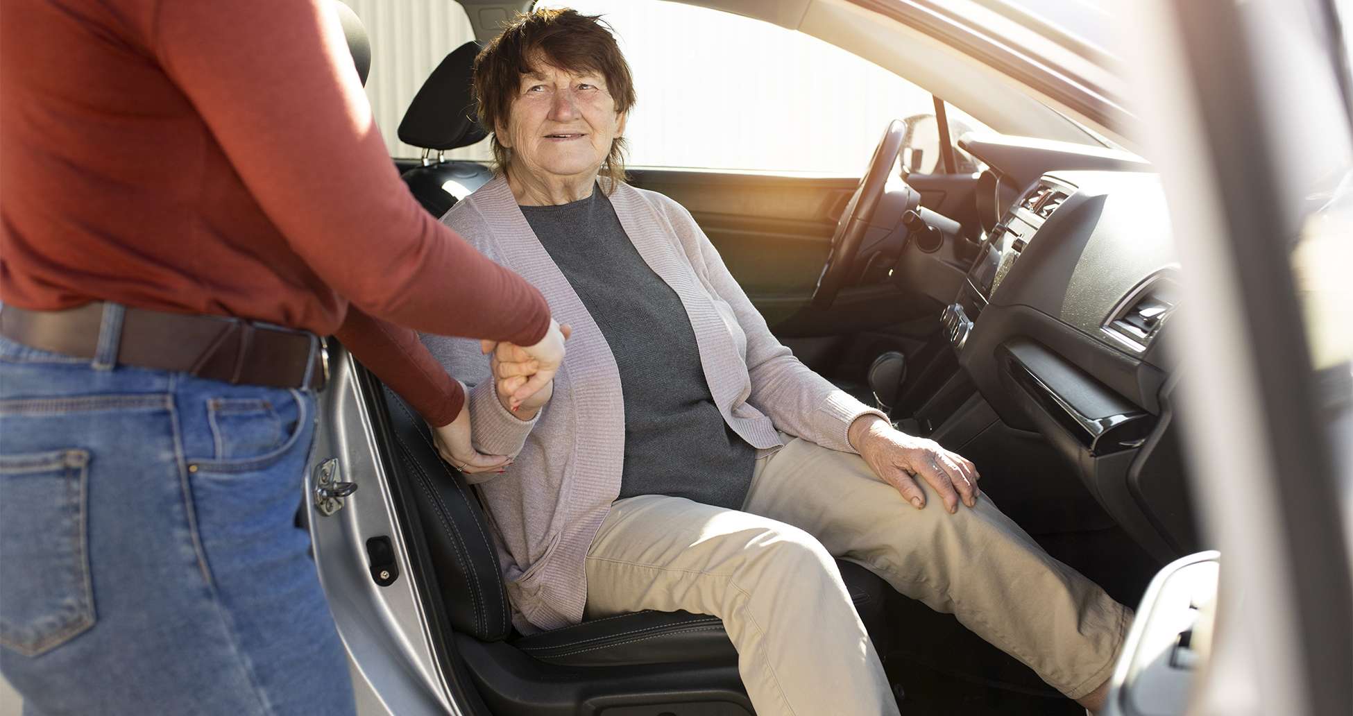 Helping old neighbor out of car-header image-beary-care